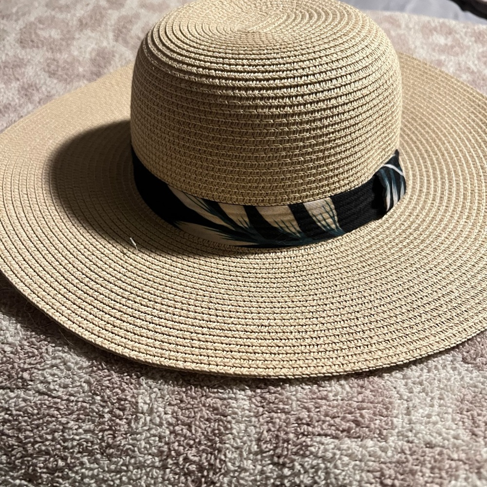 Elegant Tan Sun Hat with Black and White Band